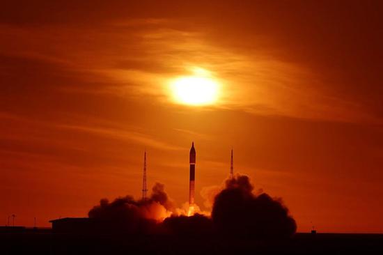 China launches carrier rocket to deploy experimental cargo ship and satellite