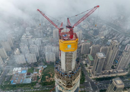 Hainan's tallest building reaches key construction milestone