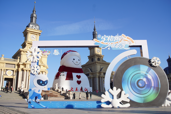 64 sculptors build 19-meter-tall snowman in Harbin