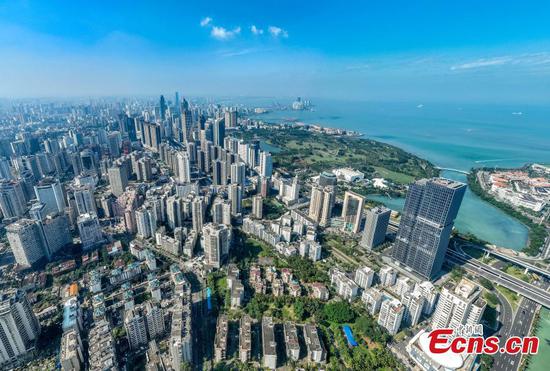 Photo taken on Dec. 17, 2025 shows buildings along Binhai Avenue in Haikou City, Hainan Province. (Photo: China News Service/ Luo Yunfei)