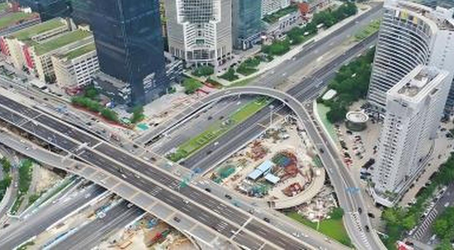 RMB could appreciate to around 6.0 against USD over next decade, former Chongqing mayor says