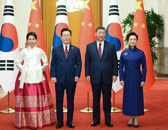 Chinese President Xi Jinping and his wife Peng Liyuan pose for a group photo with President of the Republic of Korea (ROK) Lee Jae Myung and his wife Kim Hea Kyung in Beijing, capital of China, Jan. 5, 2026. Xi held talks with Lee, who is on a state visit to China, at the Great Hall of the People in Beijing on Monday. (Xinhua/Xie Huanchi)