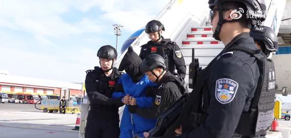 Photo released by Jan. 8, 2026 shows Chinese national Chen Zhi, head of a major cross-border gambling and telecom fraud criminal group, is repatriated from Phnom Penh, Cambodia, to China. (Photo from the weibo of China's Ministry of Public Security)