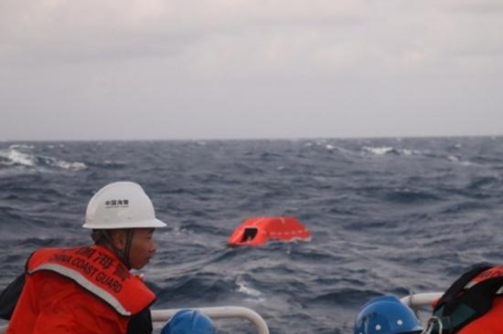 China Coast Guard says it rescued 13 Filipino sailors after a cargo ship capsized in the South China Sea early Friday