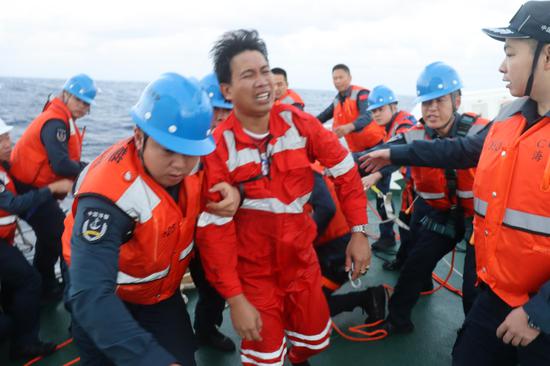 China Coast Guard rescues Philippine crew near Huangyan Dao