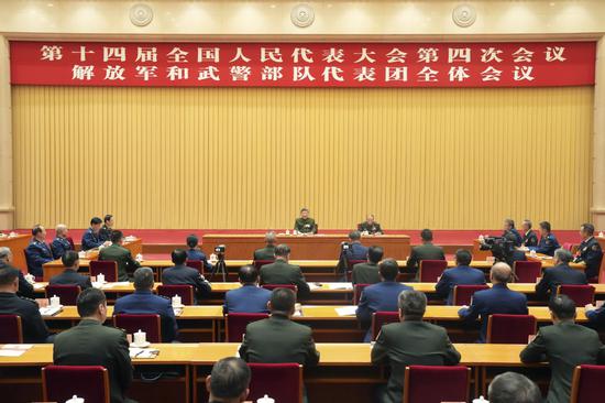 Xi attends meeting of military delegation at annual legislative session