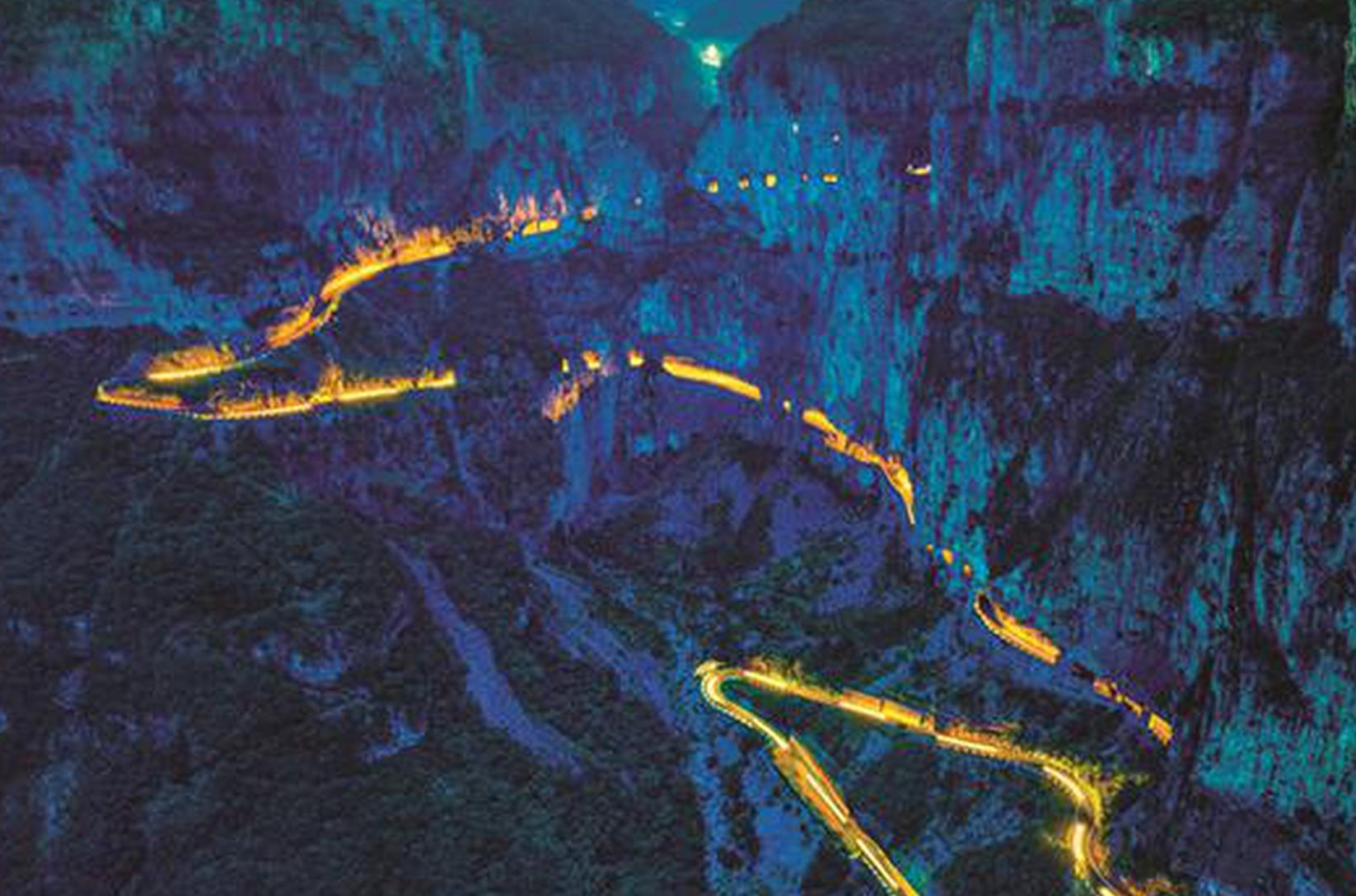 Remote villagers carve out a cliffside road to prosperity