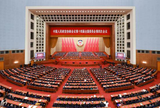 China's top political advisory body holds closing meeting of annual session