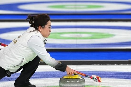 China brushes aside Italy 10-3 at World Women's Curling Championship