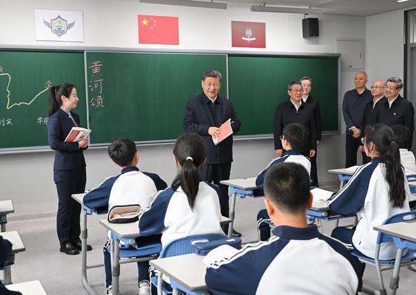 Chinese President Xi Jinping, also general secretary of the Communist Party of China Central Committee and chairman of the Central Military Commission, visits the Xiong'an campus of Beijing No. 4 High School in the Xiong'an New Area, north China's Hebei Province, March 23, 2026. (Xinhua/Xie Huanchi)