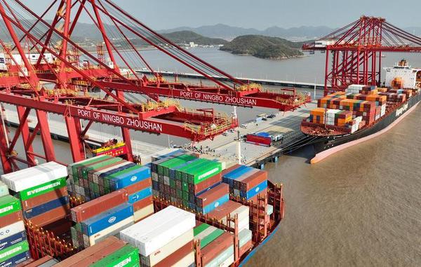 An aerial drone photo taken on Dec. 2, 2025 shows container ships berthing at the Meishan port area of the Ningbo-Zhoushan Port in East China's Zhejiang province. (Photo/Xinhua)