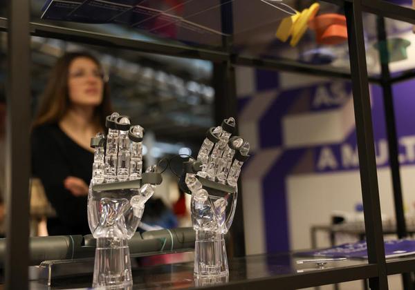 A woman visits the booth of China Academy of Art during the 64th Salone del Mobile at Fiera Milano Rho exhibition center in Milan, Italy, April 22, 2026.  (Xinhua/Li Jing)