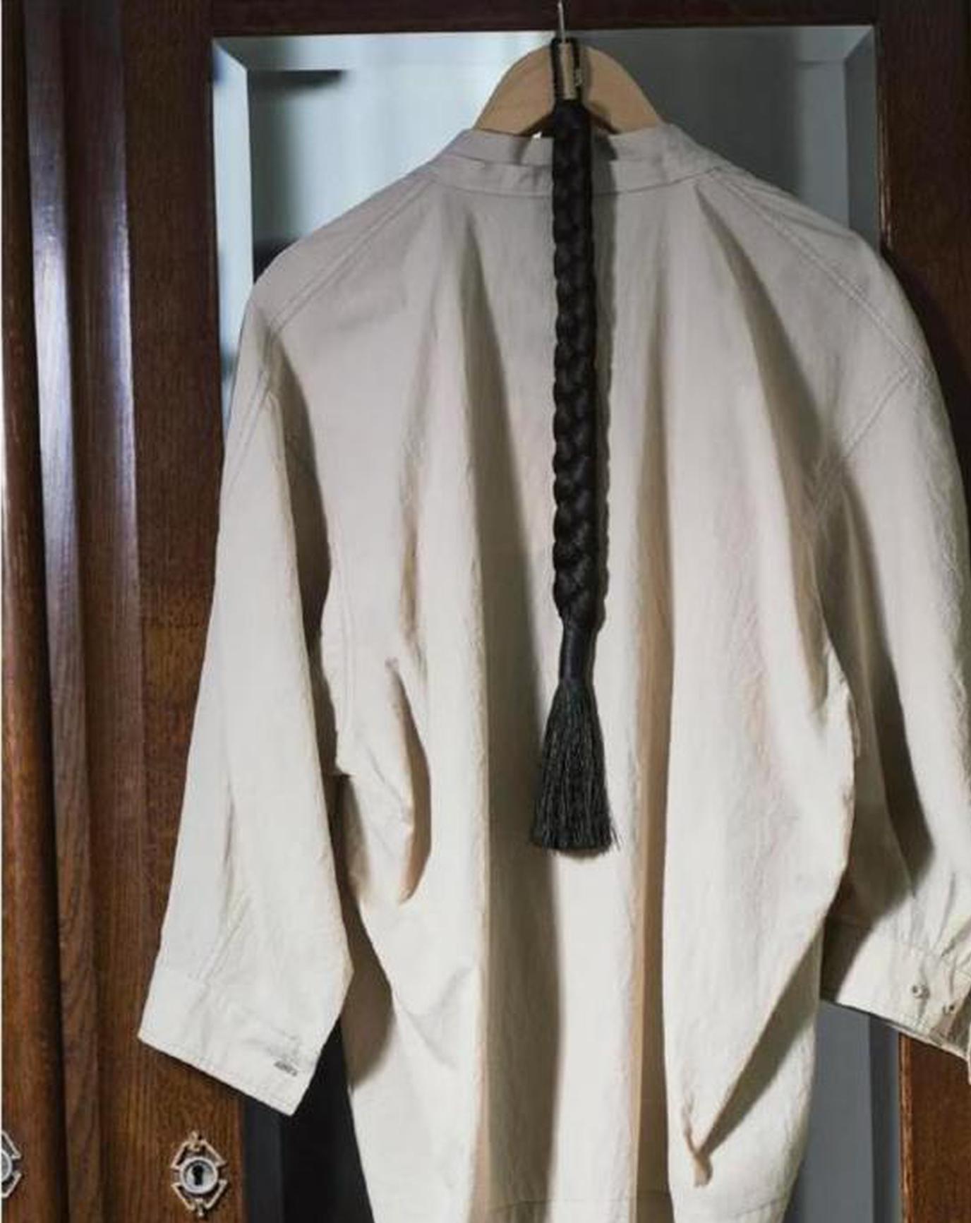 Promotional photos for Lemaire’s Objets Senteur fragrance objects featuring long braids.(Photo/Lemaire)