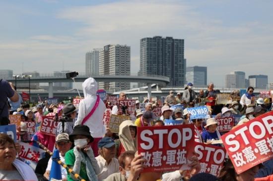 Over half of Japanese oppose lifting ban on lethal weapons exports, polls suggest