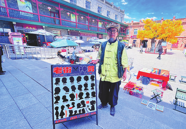 Wang Chuncai stands at his stall at the Chinese-Baroque Historic and Cultural Block in Harbin, Heilongjiang province.