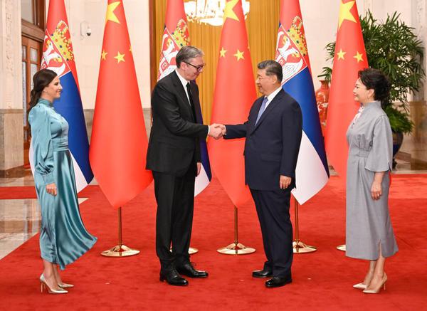 Chinese President Xi Jinping and his wife Peng Liyuan hold a welcome ceremony for Serbian President Aleksandar Vucic and his wife Tamara Vucic in the Northern Hall of the Great Hall of the People prior to the talks between Xi and Vucic in Beijing, capital of China, May 25, 2026. Xi held talks with Vucic, who is on a state visit to China, at the Great Hall of the People in Beijing on Monday. (Xinhua/Xie Huanchi)