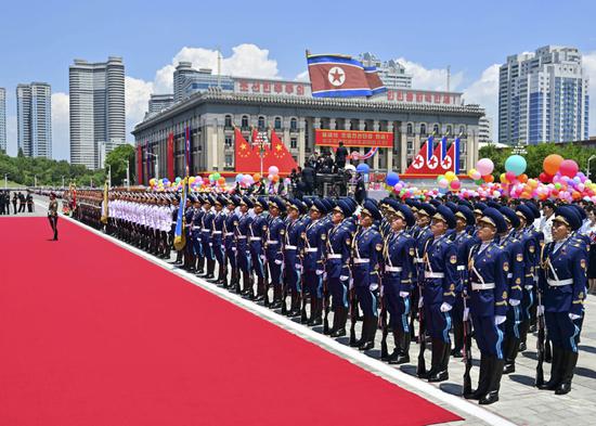 DPRK holds grand welcome ceremony for Xi Jinping