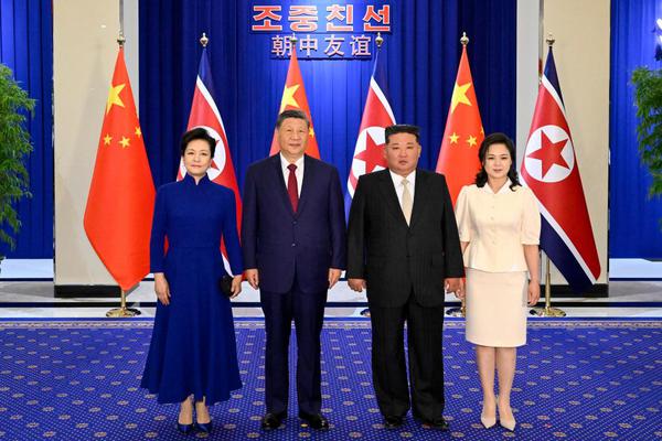 Xi Jinping, general secretary of the Communist Party of China Central Committee and Chinese president, and his wife Peng Liyuan pose for a photo with Kim Jong Un, general secretary of the Workers' Party of Korea and president of the State Affairs of the Democratic People's Republic of Korea (DPRK), and Kim's wife Ri Sol Ju, in Pyongyang, the DPRK, June 8, 2026. Xi and Peng attended a welcome banquet hosted by Kim here on Monday. (Xinhua/Shen Hong)