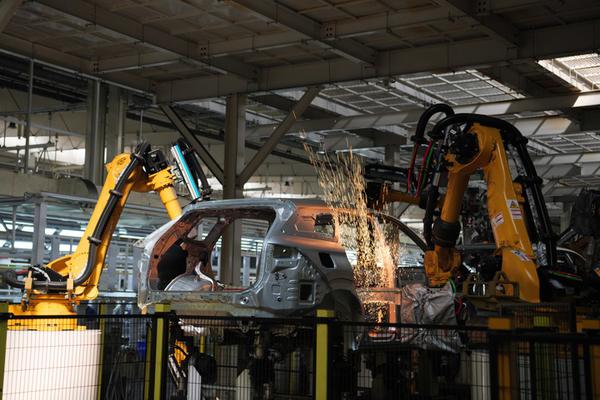 Industrial robots work on production lines at a smart factory of Chinese Automaker Chery in Wuhu, east China's Anhui Province, Sept. 12, 2024. (Xinhua/Liu Junxi)