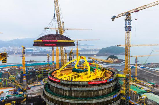 Fujian's first nuclear power project marks successful dome hoisting