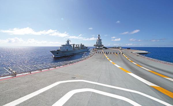 The Liaoning carrier strike group conducts replenishment during the training. LI QINGHOU/FOR CHINA DAILY