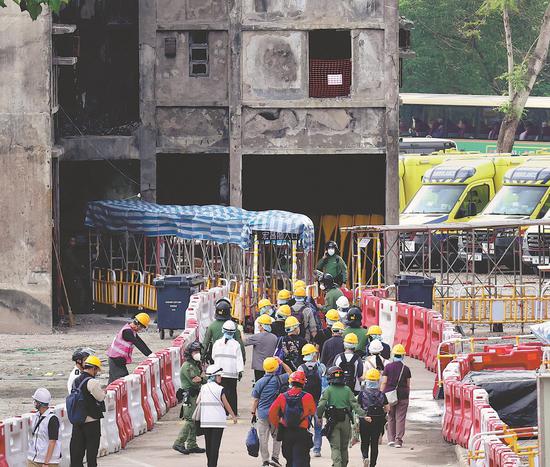 Hong Kong fire survivors rebuild lives from ashes