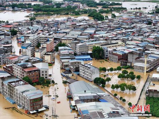 Photo taken on July 6,2026 shows a village indunted by floods in Guangxi Zhuang Autunomous Region. (Photo/China News Service)