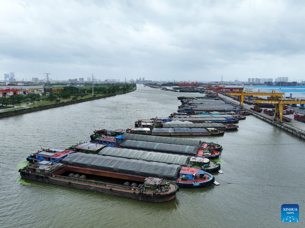 A drone photo taken on July 12, 2026 shows cargo ships anchoring at a harbor to avoid the typhoon in Changzhou City, east China's Jiangsu Province. Typhoon Bavi, the ninth typhoon of the year, landed on the coast of east China's Zhejiang Province at around 11:20 p.m. Saturday, according to the Zhejiang provincial meteorological observatory.&nbsp;&nbsp;(Xinhua photo)