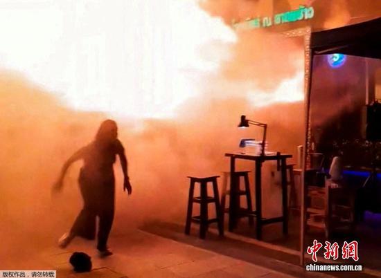 Bangkok bar blaze kills 27, flames erupt from venue