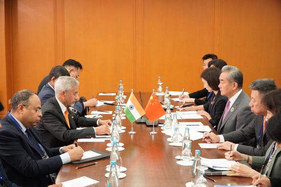 China, India should consolidate positive momentum in bilateral ties: FM Wang Yi