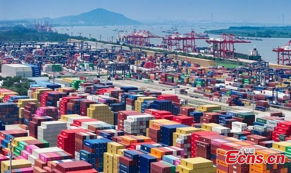 Aerial drone photo shows container ships approaching Longtan Port in Nanjing, Jiangsu Province. (File photo/China News Service)