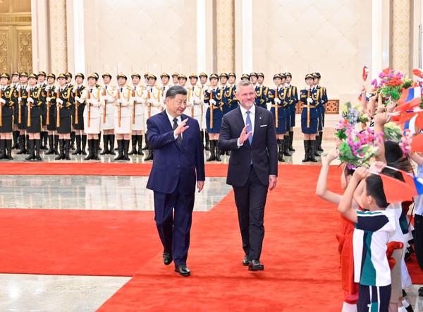 Chinese President Xi Jinping holds a welcome ceremony for Slovak President Peter Pellegrini in the Northern Hall of the Great Hall of the People prior to their talks in Beijing, capital of China, July 28, 2026. Xi held talks with Pellegrini, who is on a state visit to China, in Beijing on Tuesday. (Xinhua/Yue Yuewei)
