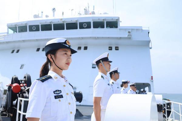 Crew members of the Chinese People's Liberation Army (PLA) Navy hospital ship, Silk Road Ark, stand in formation as the ship docks at a military port in Sanya, south China's Hainan Province, April 26, 2026. (Photo by Cui Xiaoyang/Xinhua)