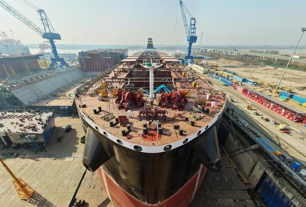 A drone photo taken on Jan 13, 2026 shows a ship under construction at a shipyard of Cosco Shipping Heavy Industry (Yangzhou) Co Ltd in Yangzhou, East China's Jiangsu province. [Photo/Xinhua]