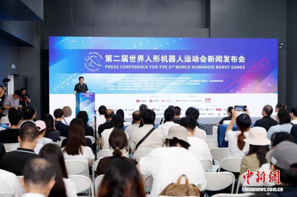 A press conference for the second World Humanoid Robot Games is held at the National Speed Skating Oval, also known as the “Ice Ribbon,” on Aug. 13, 2026. (Photo: China News Service/Han Haidan)