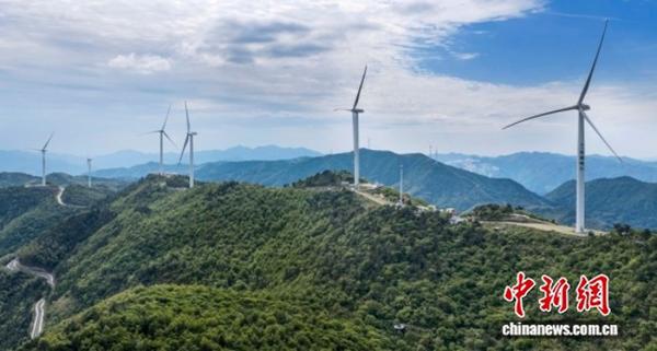 Wind turbines stand among the rolling mountain ranges in Xianju County, Taizhou, Zhejiang Province on May 9, 2026. (Photo: VCG)