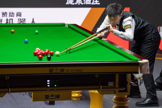 China player Zhao Xintong competes during the first round in the 2026 China Open Snooker, August 11, 2026. (Photo: Xinhua/ Cao Yang)