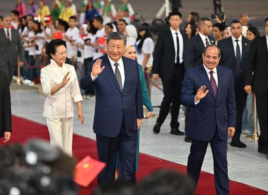 Xi arrives in Cairo for state visit to Egypt