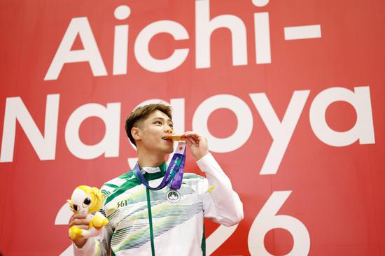 Kuong Chi Hin of China's Macao wins gold in Men's Changquan Final at 20th Asian Games