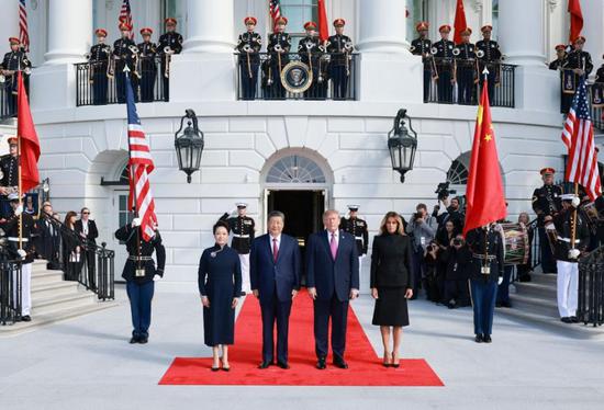 Xi attends welcome ceremony held by Trump