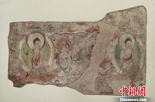 流失海外的龟兹石窟壁画图片形式在新疆展出