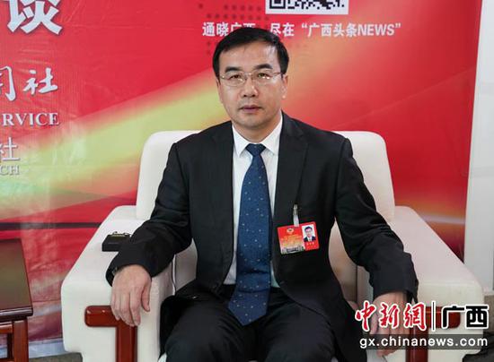 1月29日,李万春接受中新社专访。陈冠言 摄 1月29日,李万春接受中新社专访。陈冠言 摄