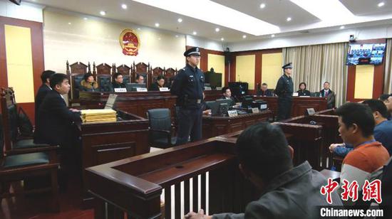 图为庭审现场。 陶新妮 摄 图为庭审现场。 陶新妮 摄