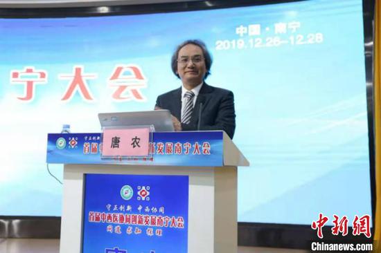 图为广西中医药大学校长唐农发言 林浩 摄 图为广西中医药大学校长唐农发言 林浩 摄