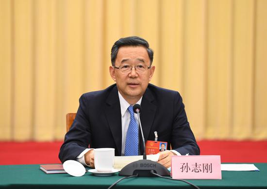 杜鹏程 摄 资料图:贵州代表团审议政府工作报告,孙志刚参加审议。 杜朋城 摄