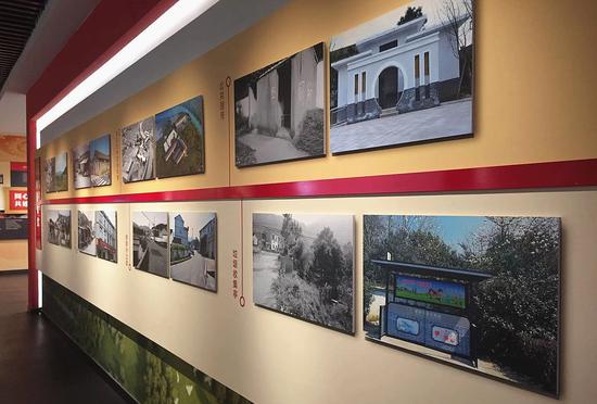 村内展馆展示着村庄今昔对比。李典 摄