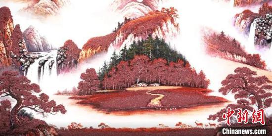 图为朱砂画 周燕玲 摄