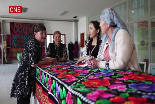 Kazakh embroidery production helps female villagers increase income in China's Xinjiang