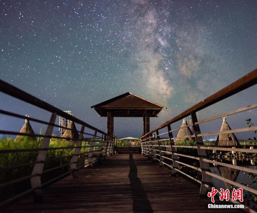 Starry night sky with Milk Way over Nalati National Wetland forms a fantasy landscape in northwest China's Xinjiang Uygur Autonomous Region, July 24, 2023. (Photo: China News Service/Zhang Wenting)