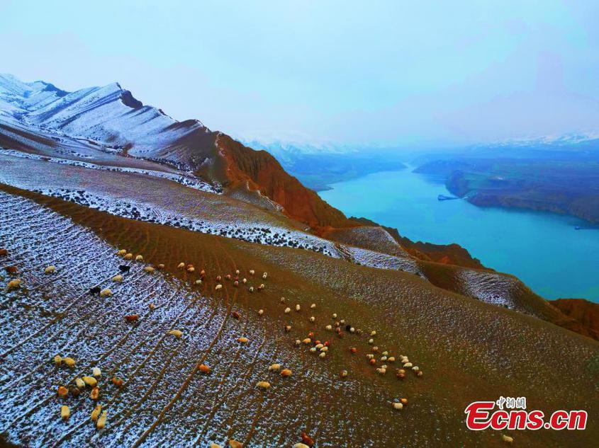 Snow-covered Danxia landform in Xinjiang